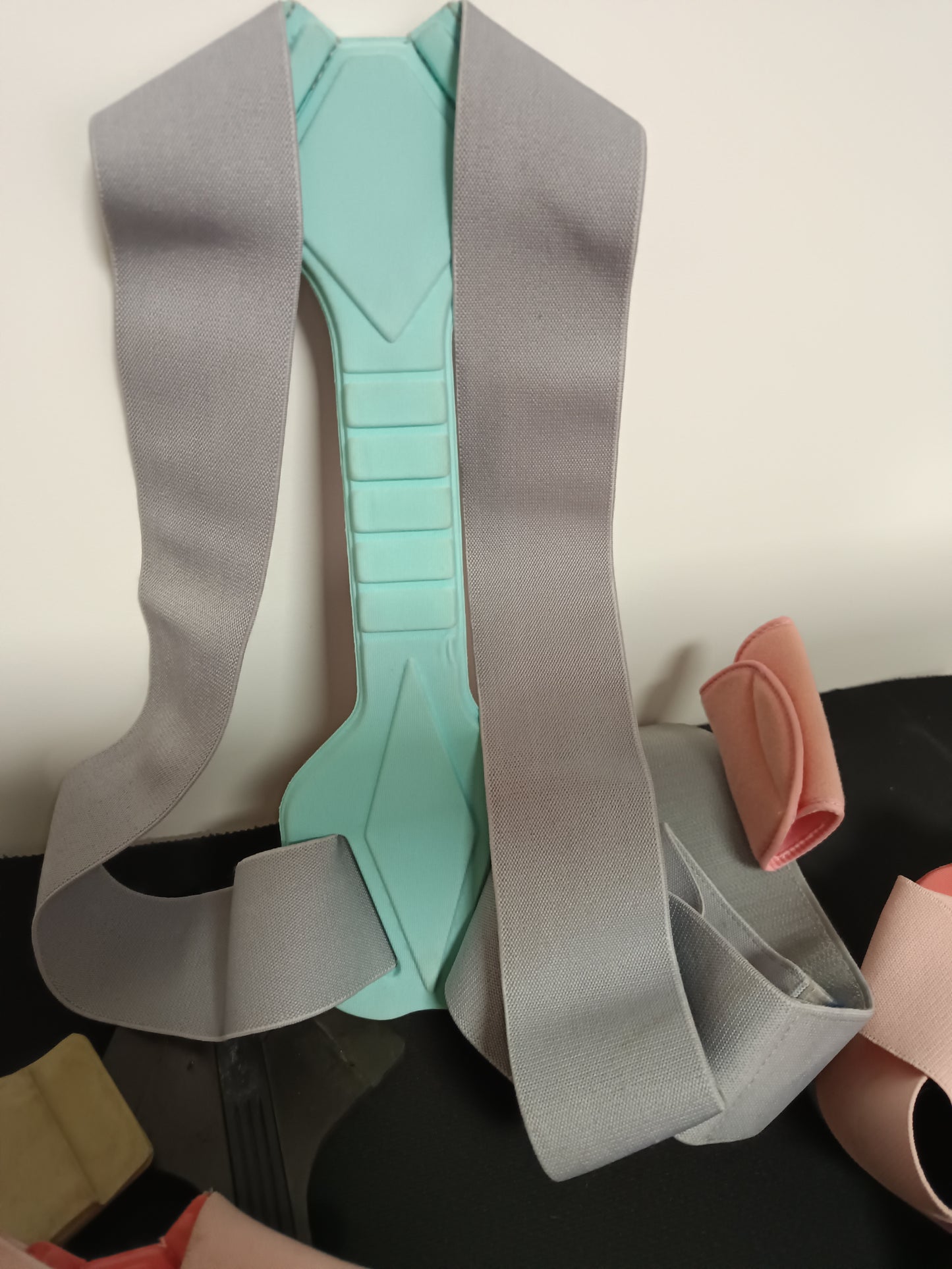 Adjustable shoulder straps on the posture corrector for a custom fit