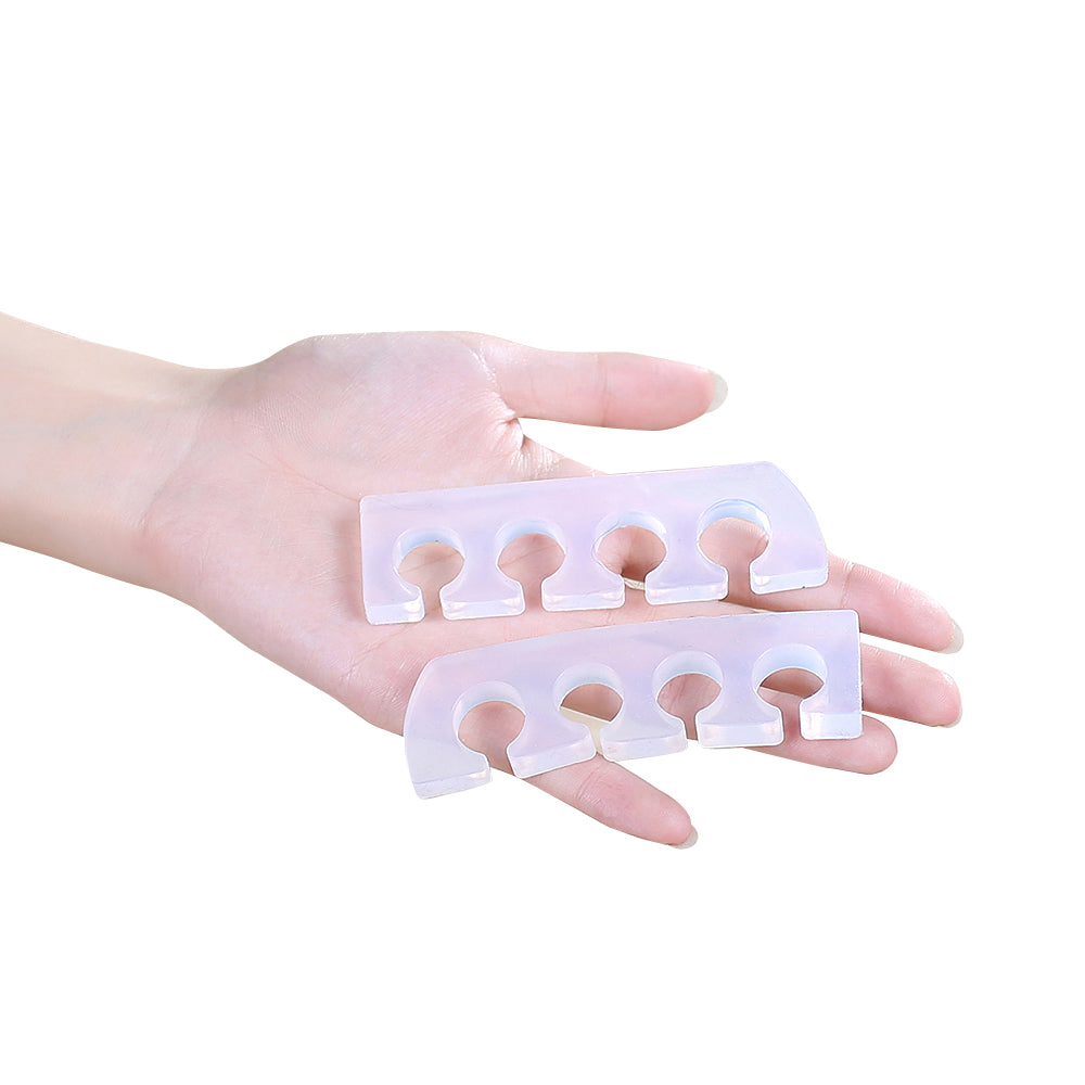 Adjustable toe separator for improving toe alignment and reducing discomfort