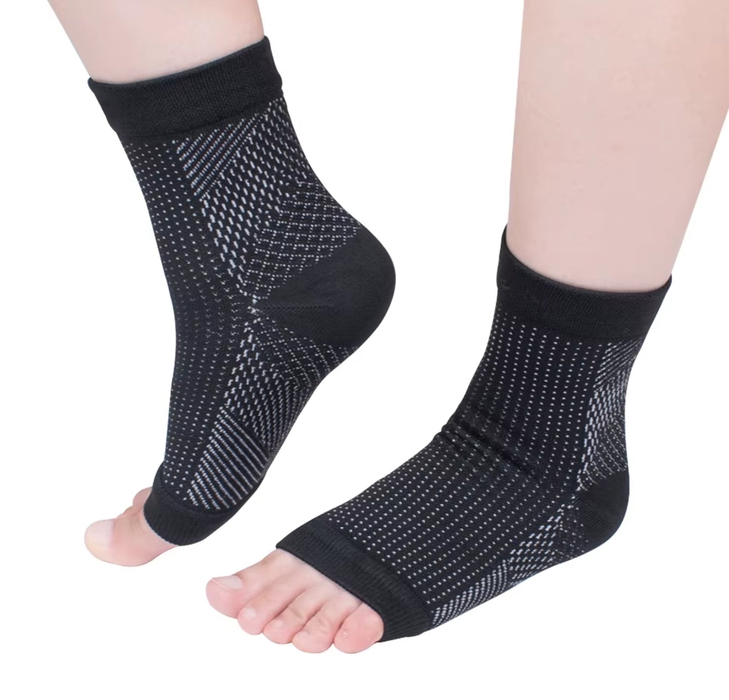 Athlete wearing a white Achilles tendon brace sleeve while running on a track.