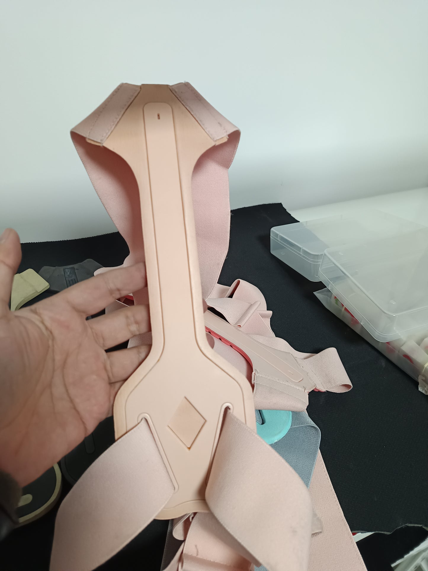 Close-up of the flexible plastic support panel in the posture brace