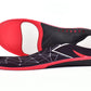 Insoles in sneakers showing 3/4 length and high arch elevation.
