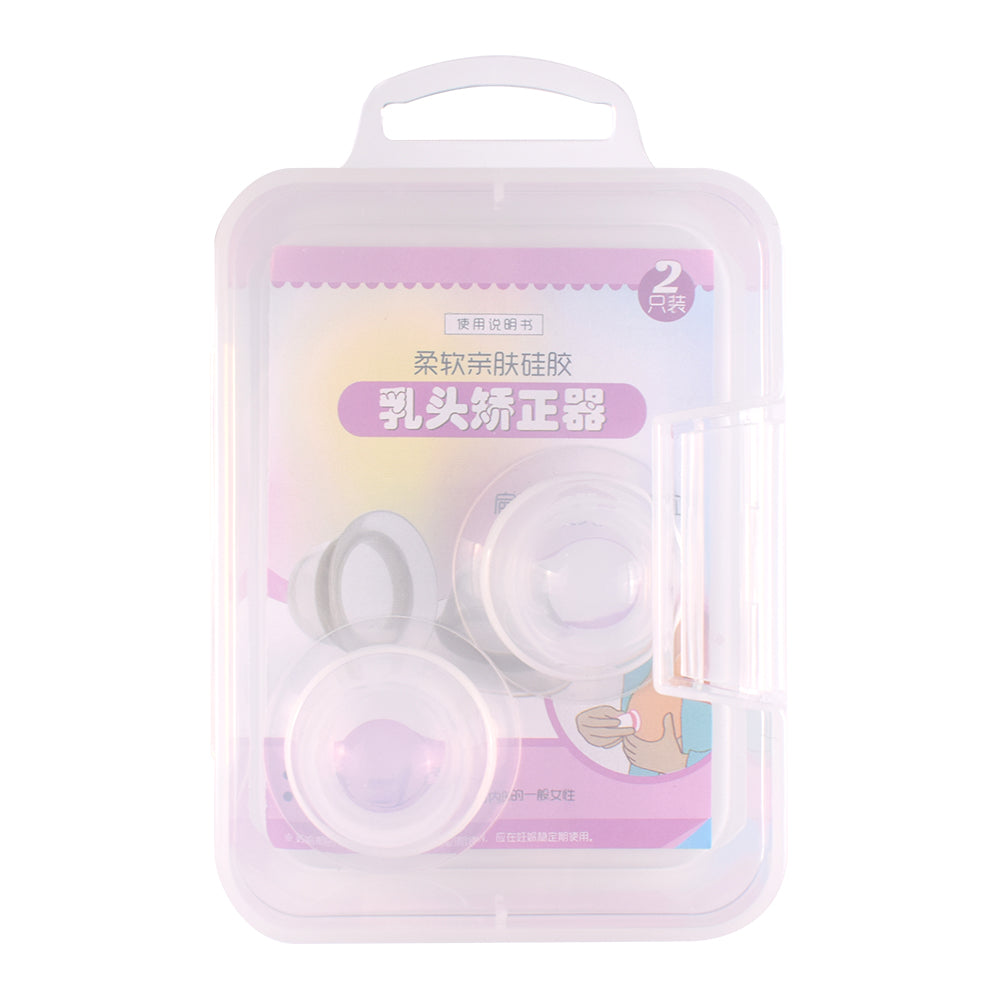 Nipple everter shown in hand or with a coin for size and scale reference