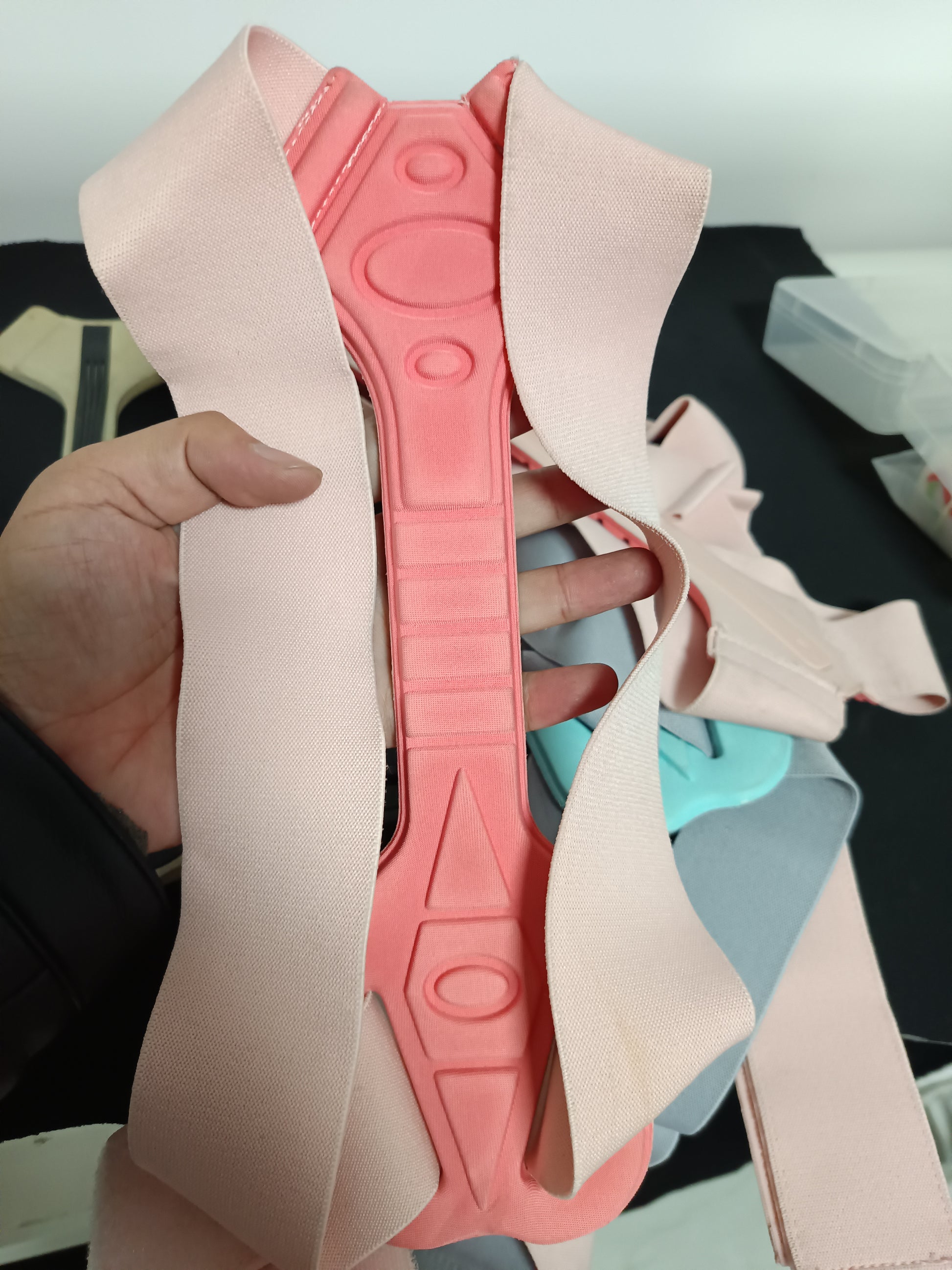 Person comfortably wearing the posture correction brace under a t-shirt