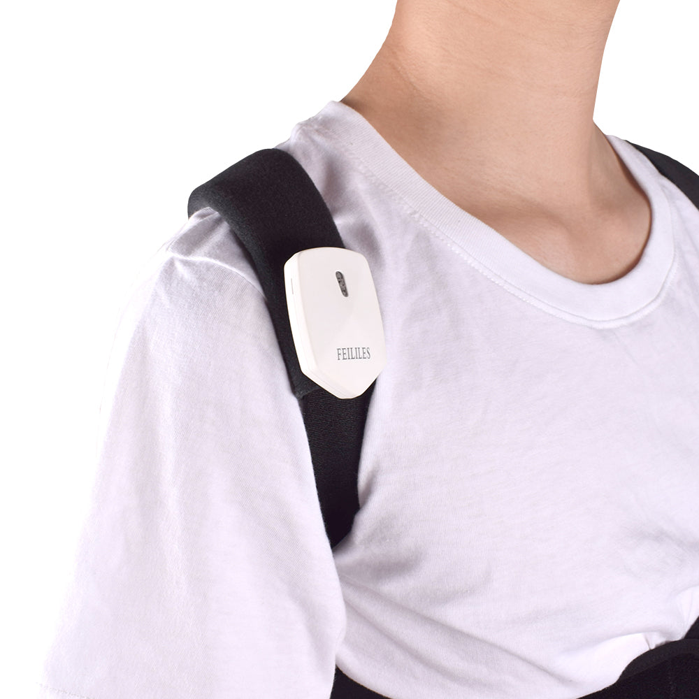 Person wearing electronic posture corrector for hunchback