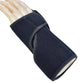 A dark navy blue wrist and forearm support brace shown on a mannequin hand against a plain white background.
