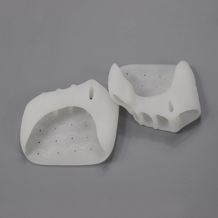 Woman wearing silicone bunion corrector forefoot cushion pad