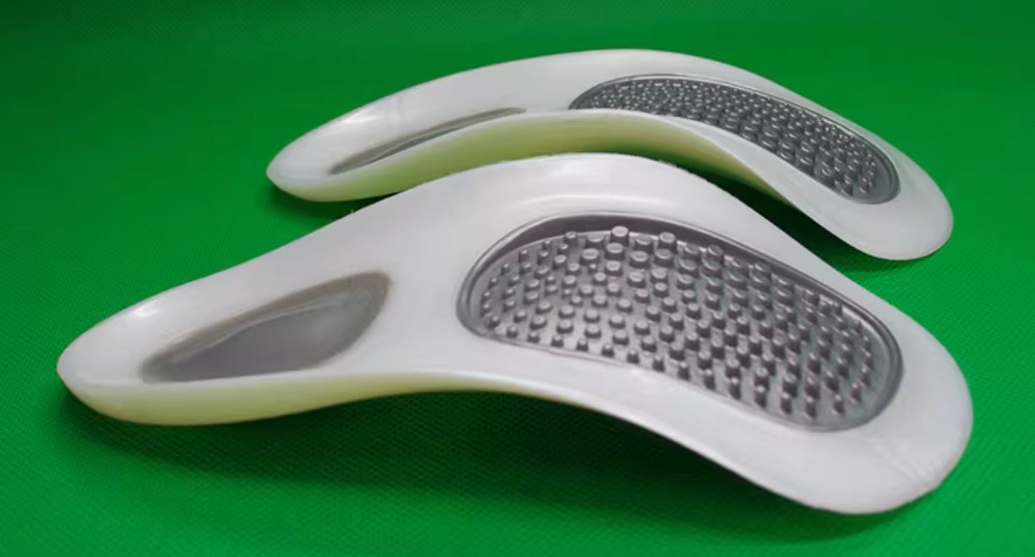 foot care insoles with massage and arch support features