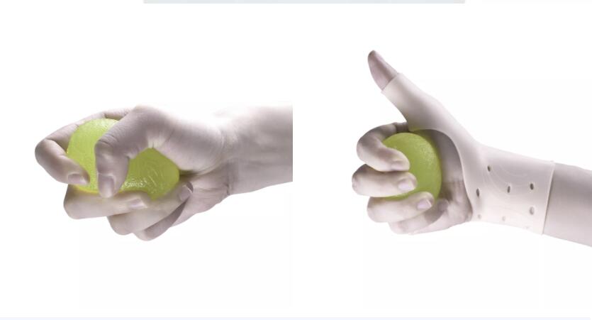 Hand demonstrating the ergonomic grip on an egg-shaped silicone hand therapy ball